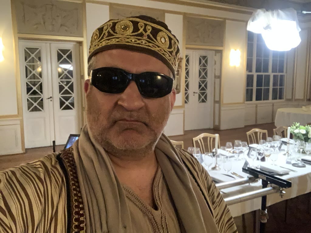 Aria Farjadi som Muammar Gaddafi